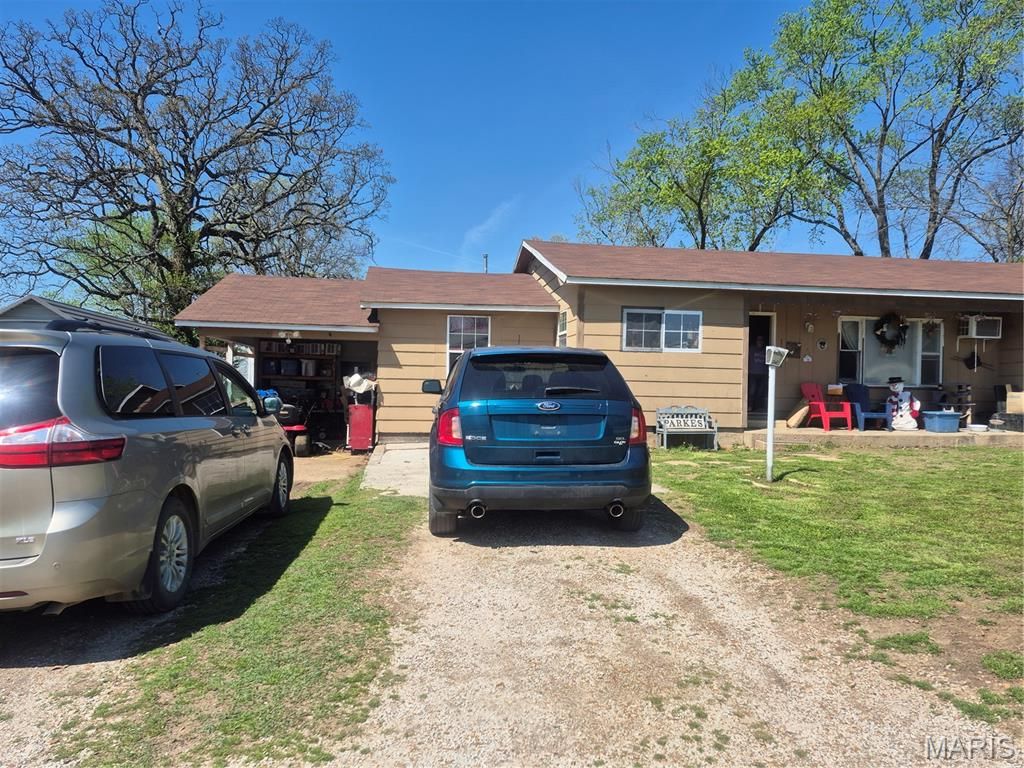 Photo of 501 N Walnut Street, Fair Play, MO 65649 (MLS # 26021556)