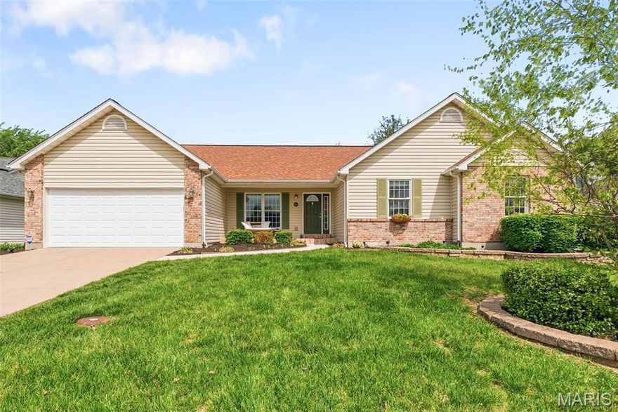 Welcome Home to this beautifully maintained ranch, perfectly situated on a quiet street in highly sought-after Fort Zumwalt South school district with easy access to shopping, dining, parks, and major highways. From the moment you arrive, you’ll be impressed by the home’s curb appeal and inviting presence. Step inside to an airy, open floor plan enhanced by soaring vaulted ceilings, abundant natural light, and a warm, woodburning fireplace that anchors the main living space. Fresh paint, new carpet, and stylish luxury vinyl flooring in the bathrooms and main-floor laundry room add a fresh, modern touch throughout. The spacious kitchen is designed to impress, featuring 42-inch cabinets with crown molding, a center island with seating, and a seamless flow into the breakfast room—ideal for both casual meals and entertaining guests. A versatile den offers the perfect space for a home office or can easily be transformed into a formal dining room. The main level includes three generously sized bedrooms and two full baths, including a serene primary suite with a walk-in closet and an en suite bath complete with a separate tub and walk-in shower. Convenient main-floor laundry makes everyday living a breeze. Enjoy year-round indoor-outdoor living with a bright enclosed 4 season sunroom and a large patio overlooking the backyard—perfect for relaxing mornings or evening gatherings. The yard is equipped with an irrigation system to keep your lawn looking its best all season long.
The expansive, dry, unfinished basement with a rough-in provides endless opportunities to customize and expand your living space to fit your needs. Move-in ready and meticulously cared for, this home offers the perfect blend of comfort, style, and future potential—truly the perfect place to call home.