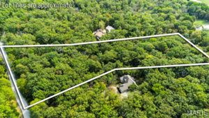 Tucked in a quiet and private setting and easily accessible from the Main Gate and Konstanz Gates at Innsbrook, 2142 Meadow Valley offers the best of both worlds—peaceful seclusion surrounded by nature, yet just minutes from the action. This 4.12-acre wooded lot is perfectly positioned on a paved road, with mature trees, rolling terrain, and a meandering stream that invites deer, birds, and other wildlife to your backyard. The topography provides an ideal canvas for your dream home, including the opportunity for a walkout lower level with wooded and Creekside views. Just down the road, Charrette Commons awaits with a community pool, fitness center, playground, and gathering spaces. You’ll also enjoy easy access to Lake Alpine, Innsbrook’s stables, and the many recreational amenities that make the community so special. Whether you envision a weekend retreat or a forever home, this property delivers a rare combination of privacy, natural beauty, and convenience—an opportunity to create your own slice of paradise in the heart of Innsbrook. There's no deadline to build and you can enjoy all of Innsbrook's amenities in the meantime.