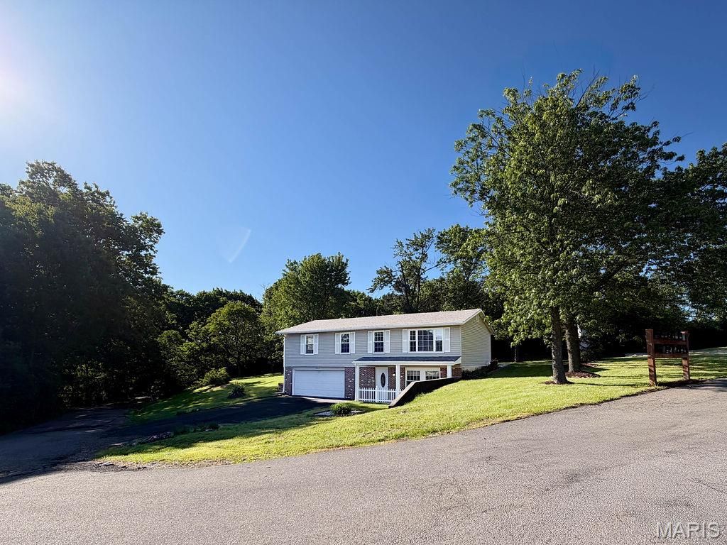 Photo of 3344 Woodland Trl Trl, Imperial, MO 63052 (MLS # 26026595)