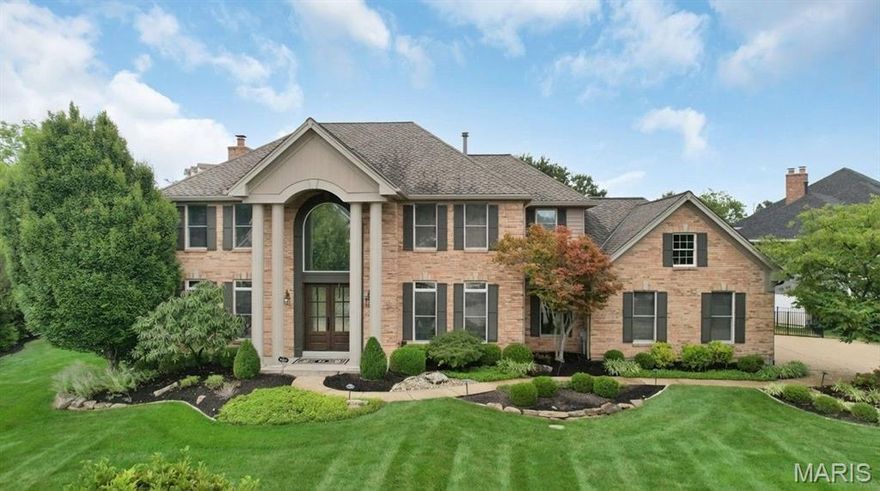 Set on a coveted corner lot in the sought-after Sea Beauty Farm neighborhood, this exceptional residence offers nearly 6,000 square feet of thoughtfully remodeled living space where timeless design meets modern luxury. Rich wood floors flow throughout, complemented by custom cabinetry, built-in bookcases, and striking wood ceiling beams that highlight the home’s architectural character. The heart of the home is an expansive chef’s kitchen, anchored by a dramatic oversized island, quartz countertops, gourmet stainless steel appliances, and an elegant wet bar with a second sink—ideal for entertaining at scale. An oversized three-car garage connects seamlessly to a main-level laundry room with a functional mudroom drop zone. Upstairs, the primary suite is a private retreat featuring a spa-inspired bath with dual vanities, a soaking tub, a spacious tiled shower, and integrated Bluetooth speakers for effortless ambiance. Two secondary bedrooms share a well-appointed Jack-and-Jill bath, while the third enjoys its own private bathroom. The finished lower level expands the living experience with a full bath, home gym, wine and snack bar, family room, playroom, and dedicated office space. Outdoors, a newly constructed covered patio with gas fireplace and outdoor kitchen creates a year-round entertaining haven. With four fireplaces throughout, this home delivers warmth, elegance, and exceptional livability at every turn.