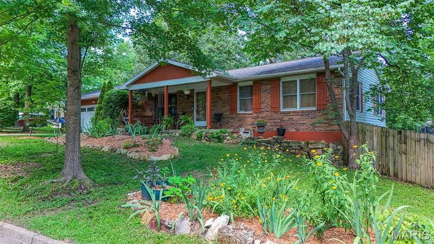 Welcome home to this stunning 5-bedroom, 3-bathroom residence offering over 3,200 square feet of beautifully crafted living space on a private, wooded lot backing directly to the woods and the Acorn Trail. From the moment you step inside, you’ll appreciate the warmth and character created by custom woodwork throughout the home, including elegant interior wood shutters in four of the bedrooms. Natural light pours into the home, especially in the spectacular 900-square-foot m/l living room, where vaulted ceilings and an entire wall of sliding glass doors create a bright, airy atmosphere and seamless connection to the outdoors. A cozy wood-burning stove anchors the space, making it equally inviting for gatherings or quiet evenings in. The kitchen offers both style and function, complete with a walk-in pantry and brand-new flooring (2025). Additional new flooring in the bathroom and finished basement adds a fresh, updated feel throughout. The finished basement provides flexible living space along with a spacious laundry room designed for convenience and organization. Step outside to enjoy peaceful mornings or relaxing evenings on the screened-in porch overlooking the private, fenced-in backyard. The lot is thoughtfully landscaped with abundant native plantings and mature trees, creating a natural retreat right at home while offering direct access to nature just beyond your property line. Recent updates provide peace of mind, including a new roof (2025) and a 2-year-old HVAC system. With its generous living spaces, abundant natural light, quality craftsmanship, modern updates, and unbeatable natural setting, this home offers the perfect blend of comfort, beauty, and privacy. Don’t miss the opportunity to make it yours!