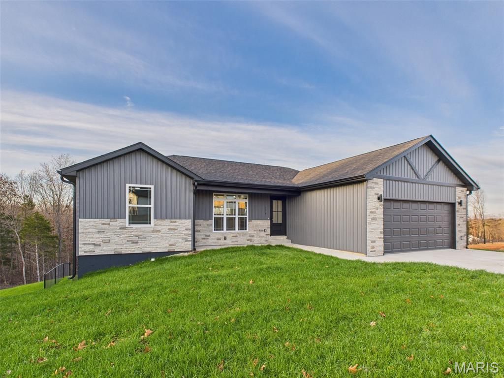 Photo of 176 Teton Pass, Waynesville, MO 65583 (MLS # 25080217)