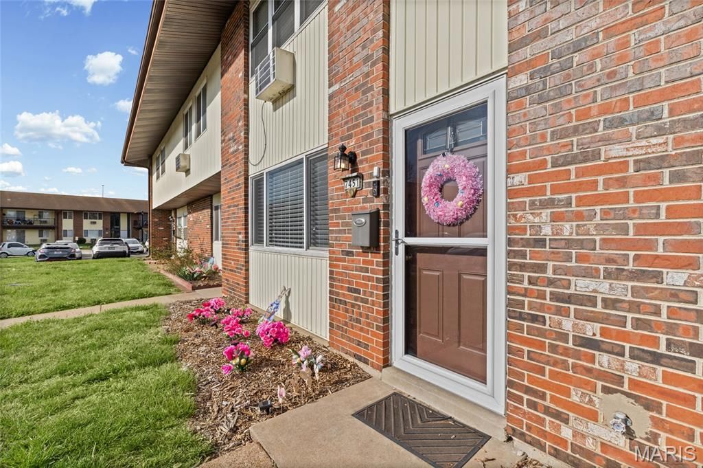 Photo of 7451 Hazelcrest Drive, Hazelwood, MO 63042 (MLS # 26017064)