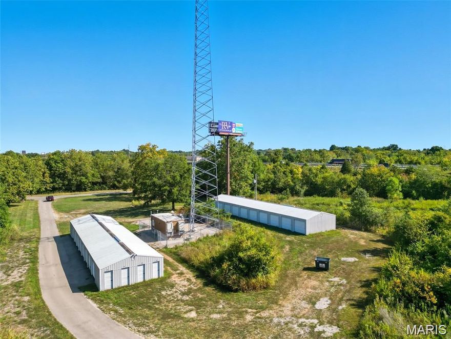 Don’t miss this rare opportunity to own a highly versatile commercial property located just off Highway 67, north of the Leadington exit and directly across from Mineral Area College, offering excellent visibility and accessibility in a high-traffic area. Income streams include a billboard generating $2,400 annually and a cell tower bringing in $7,200 per year. WE HAVE A QUALIFIED BUYER FOR THE CELL TOWER so you could buy the property and sell the cell tower at closing and use for your down payment! Call for details!  The property also includes two separate buildings with a total of 44 self-storage units which are currently vacant and could be rented to increase the cash flow by upwards of $3500/month. There is also an area with existing hookups for a modular home, adding to its versatility. With its strategic city location, high-traffic exposure, and highway frontage, this property is a rare find. Incredible investment opportunity! Possible creative financing opportunity for a qualified buyer!