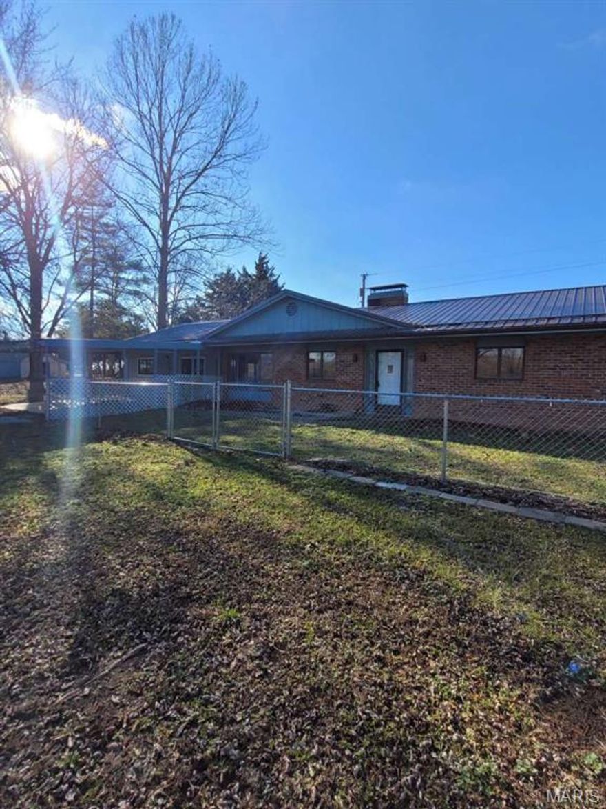 11 acre, 4 bedroom, 2 bath, brick house central heat and air, working wood burning fireplace.
3 acre private lake, 4 outbuilds including heated and air shop, 30'x50' shop. Fenced for livestock.
Fiber internet, county water. 
Completly renovated inside in 2022 also new metal roof. 
Located at End of private gravel lane.  5 additional acres available.