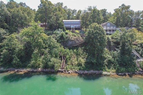 Photo of 211 Ripley 142E-2B, Doniphan, MO 63935 (MLS # 26060459)