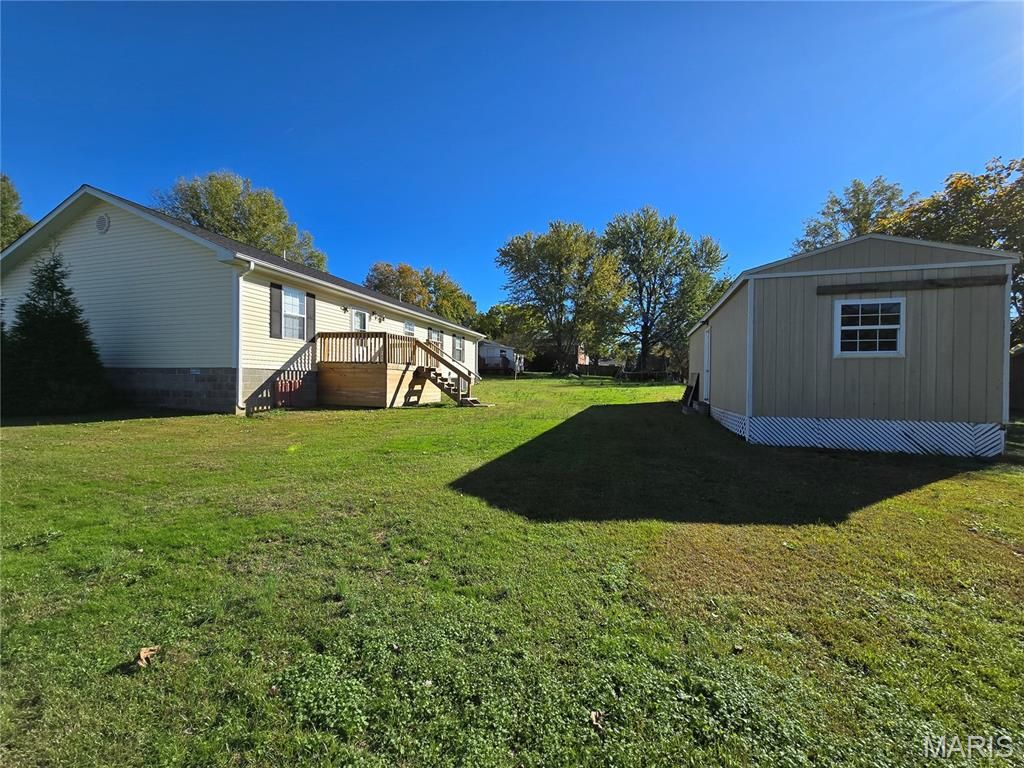 Photo of 2 Kelly Street, Dexter, MO 63841 (MLS # 25073590)