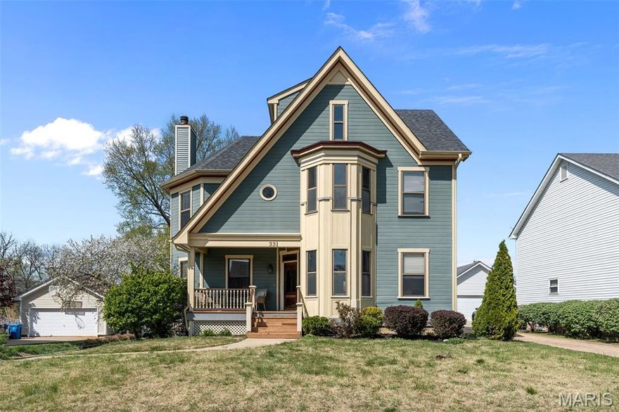 Character. Space. Value. This one checks every box.
Step into something truly rare for Florissant — a 2,600 sq ft, 3 story, Victorian charmer with 1990 new-build convenience. The curb appeal alone stops traffic: teal and cream exterior, steep gabled roofline, bay tower windows, oval accent window, covered front porch and turned spindle railings — this is not your average 1990 build, and it shows from the moment you pull up.
Inside, the original character has been preserved and thoughtfully updated. Rich hardwood floors flow through the main level, complemented by warm wood trim, craftsman-style door casings, and a beautiful open staircase with hardwood treads that anchors the center of the home. The formal entry foyer opens to generously sized living and dining rooms — perfect for hosting and for fires in the winter. 
The kitchen has been freshly updated and is ready for its new owner: white shaker cabinetry, a showstopper quartz island, warm backsplash, and a large walk-in pantry. The kitchen includes a large eating area and main-floor powder room give you daily life convenience. A bonus sunroom addition off the rear features a stunning wood-plank ceiling and ceiling fan — perfect for "most of the year" enjoyment.
One the second floor you'll find 2 bedrooms and 2 full bathrooms: the primary suite with en-suite bath and another large bedroom, original trim throughout, and a full hall bath. On the 3rd floor is two additional bedrooms-one with an en suite half bath.  The finished basement adds another 740 sq ft of flexible living space — currently configured as a media/rec room with a bar setup and recessed lighting. You also have the convenience of a walk-out basement with attached two-car garage.
The property is move-in ready for the right buyer looking for authenticity, great value, and a neighborhood with genuine charm.  The last home to sell on this unique street was 318 Reighley Place 2 years ago...do NOT miss your chance to own this once in a lifetime type property.  You WILL fall in love!
