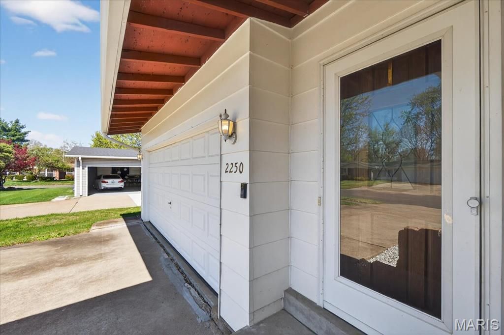 Photo of 2250 Loveland Drive, Florissant, MO 63031 (MLS # 26020190)