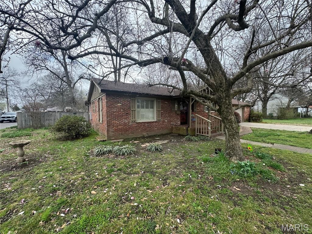 Photo of 933 Beckwith Avenue, Caruthersville, MO 63830 (MLS # 26014056)