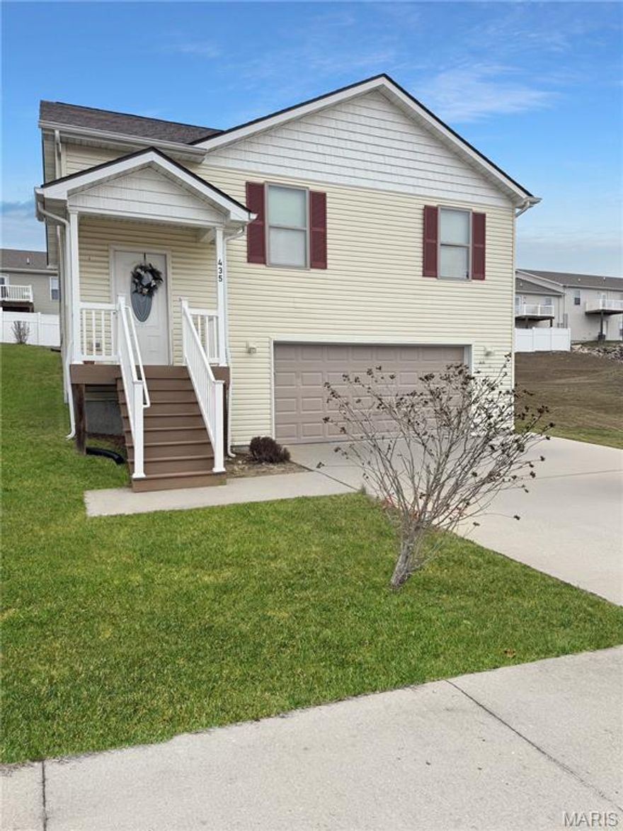 Super Cute Home with Spacious Living! Enjoy an open-concept layout featuring a bright great room, dining area, and kitchen designed for easy everyday living and entertaining. A door off the main living space leads to the backyard and patio—perfect for relaxing or hosting friends.The main level offers two comfortable bedrooms and a full hall bath. The lower level includes an entry area, additional storage, a large two-car garage with zero-entry access into the home, plus a private bedroom and full bath. This flexible lower-level setup is ideal for a roommate, guest suite, or family member—offering the potential for extra income if desired.
Built in 2017, this home offers modern construction and low-maintenance living. Why rent when you can own? Schedule your showing today!