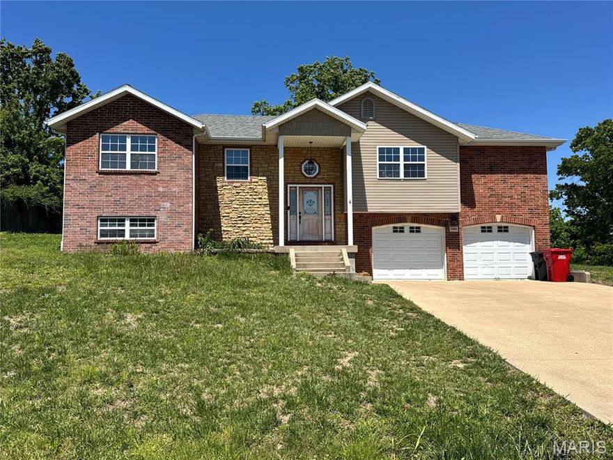 Welcome to this spacious 5-bedroom, 3-bath home with a large yard in the beautiful Shalom Mountain. Enter this inviting split-level home and head upstairs to the spacious living room, where a beautiful fireplace is just waiting for you to enjoy. With plenty of room for family and guests, this home offers comfort, space, and charm throughout  2 laundry rooms.  Enjoy the oversized garage with a "John Deer" room perfect for all those special tools or maybe a craft room.  Spend your evenings out back feeding the horses or simply relaxing by the fire pit.