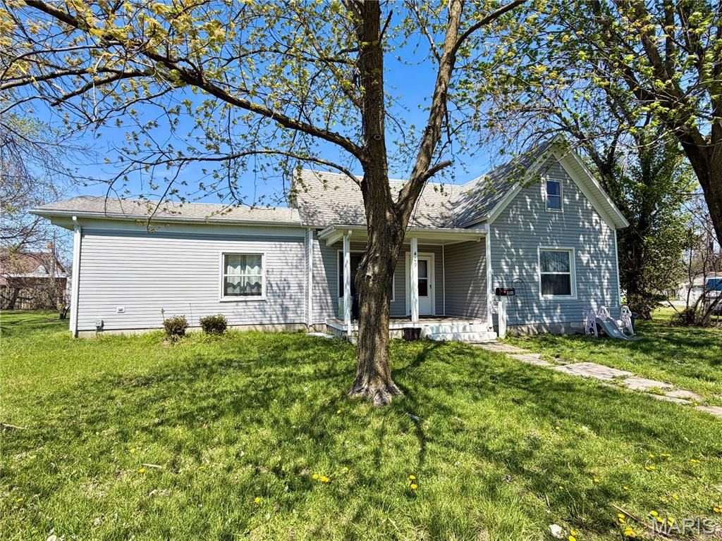 Photo of 409 N 2nd Street, Wellsville, MO 63384 (MLS # 26021210)