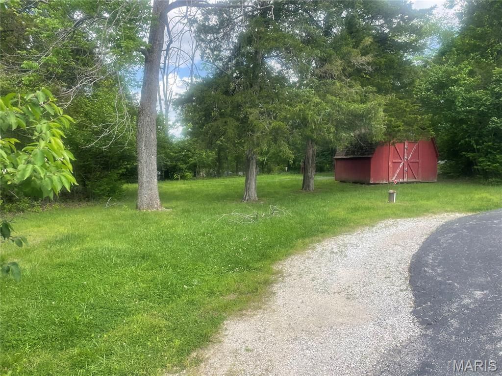 Photo of 5420 Glade Chapel Road, Hillsboro, MO 63050 (MLS # 26022792)