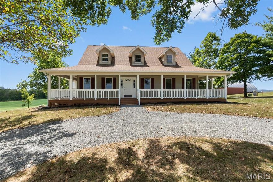 Welcome to your new home offering country living just outside of town on 4.2 acres! This spacious 4 bedroom, 3.5 bath features over 3,400 finished square feet and is move-in ready with plenty of space for your family to grow and roam. The large primary suite offers access to the covered front porch, a generous walk-in closet, and spacious bathroom with double vanity. The kitchen provides an abundance of cabinet and countertop space, stainless appliances, and is complemented by a separate dining area and an additional breakfast nook, perfect for casual meals. Enjoy cozy evenings in the expansive living room with a wood-burning fireplace, or head upstairs to find three additional bedrooms and another full bath. The walk-out basement boasts a full bath and an enormous finished area, ideal for a family room or play area as well as extra rooms for storage and a convenient tuck-under garage.
Step outside to relax on the large covered front porch or the expansive back deck overlooking the backyard. For those needing additional space, there’s a 28'x28’ detached garage with a little customization could be perfect for the hobby of your choice, or extra storage. Don’t miss out on this opportunity to enjoy the peace and space of the country living, all with modern comforts!