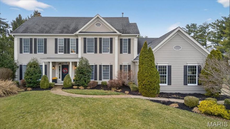 This stunning 5-bedroom, 4.5-bath Colonial is perfectly situated on a .56-acre cul-de-sac lot in the highly sought-after Stonebriar neighborhood, one of the larger lots in the community. A dramatic two-story foyer welcomes you with a curved split staircase and exquisite custom millwork and molding. Rich hardwood floors flow throughout the main level. The heart of the home is truly the kitchen-designed to impress and built for gathering. A spectacular 12-foot island anchors the space, complemented by a show-stopping hood, professional-grade Viking range with double ovens, custom cabinetry, and a new Sub-Zero refrigerator(2021). The adjoining vaulted hearth room offers warmth and charm with a gas fireplace, while a built-in planner’s desk and cabinetry provide everyday functionality. The living room features its own gas fireplace, creating an inviting setting for entertaining or relaxing with a beautifully updated bar offering a stylish and convenient space for hosting gatherings or enjoying a quiet evening cocktail.
An updated main-floor laundry and mudroom lead to the spacious three-car side-entry garage where you will find an electric car charger.  Upstairs, the expansive primary suite features tray ceilings and a large walk-in closet thoughtfully designed with a built-in yoga studio, creating a private wellness retreat right at home. The spacious en suite bath includes a jetted soaking tub, separate shower, and dual vanities. Two bedrooms share a Jack-and-Jill bath, and a fourth bedroom enjoys its own private full bath. The deep-pour newly carpeted lower level offers even more living space, including a fifth bedroom with adjoining full bath and egress window, ideal for guests or extended family. Additonal highlights include 2 new high efficency furnaces(2020), 1 new ac unit (2020), 1 new hot water heater(2020), new fence, 2 new sump pumps, new irrigation system, and new garage doors. This exceptional home seamlessly blends space, craftsmanship, modern updates, and lifestyle amenities in one of the area’s most desirable neighborhoods.