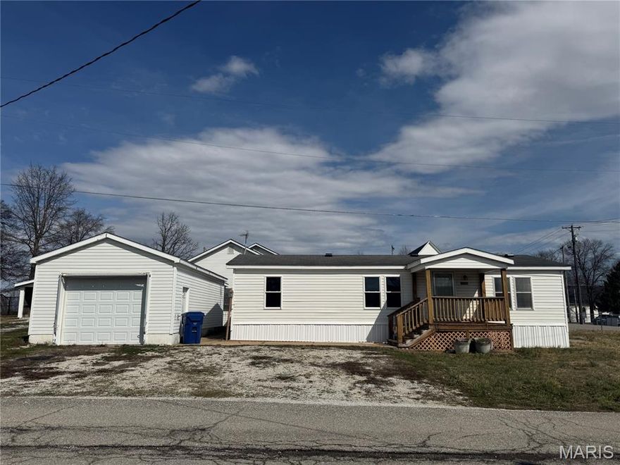 Remodeled 3 bedroom 2 bathroom double wide home in a great location with plenty of extra space/storage. New LVP flooring in living room and all bedrooms. Both bathrooms are brand new with new fixtures, flooring, and even subfloor. HVAC system is only a couple years old and all the windows in the home have been updated with double pane, tilt in windows. Enjoy your time outside on either of the two covered decks or in the yard. Small 8x8 storage shed for your lawn equipment plus a nice 16x32 outbuilding for parking, hobbies, or even a small business set up. The potential and possibilities are endless. Great priced remodeled home would even make a good investment as a rental property. All appliances in home will stay with the home.