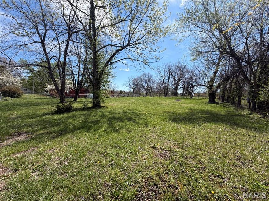 Discover the perfect place to build your dream home on these beautiful, level lots ideally situated within the city limits. Nestled on a quiet dead-end road, this property offers the peace and privacy you’ve been looking for while still being conveniently close to everything you need. Surrounded by mature trees, the lot provides a natural, established setting with plenty of character and shade. Enjoy easy access to nearby amenities including shopping, dining, medical facilities, and quick access to I-44, making commuting a breeze. The flat terrain makes for an ideal building site, giving you a head start on bringing your vision to life. Located on an asphalt road, this property combines convenience with a serene atmosphere—truly the best of both worlds. Please note, the lot is being sold AS-IS, and restrictions do apply—no manufactured or mobile homes permitted. Don’t miss this opportunity to secure a prime piece of land in a desirable location with endless potential! SALE INCLUDES LOTS 25 AND 26 (PARCEL NUMBERS 12-3.2-07-003-002-026.000 and 12-3.2-07-003-002-025.000).