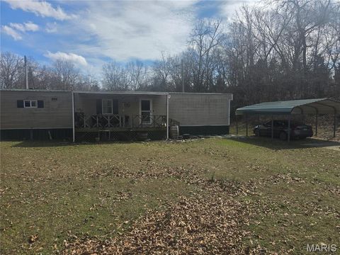 Photo of 23672 Richland Road, Waynesville, MO 65583 (MLS # 26031098)