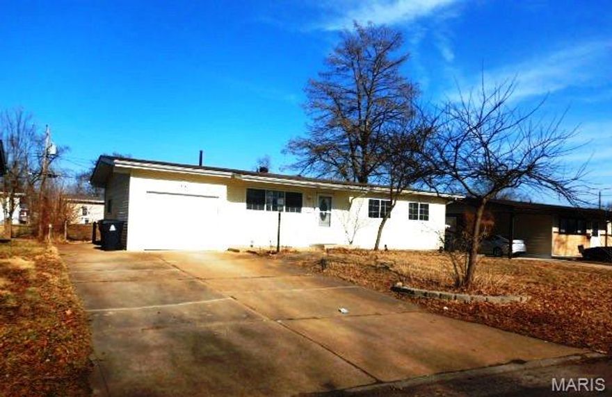 Ranch style home with an attached one car garage and large deck off the back of the house is a must see! Oversized one car garage has front and back doors for easy access of mowers, partially fenced yard, large shed with lots of room for storage! Special features include: Wood floors, insulated vinyl windows, updates to the kitchen, vinyl siding and oversized garage. Lower level is partially finished with family room and living space. Easy to show, set your appointment today!

If property was built prior to 1978, Lead Based Paint Potentially Exists. Buyer to verify schools, square footage and HOA information.