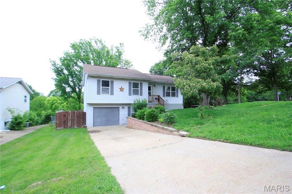 414 E CLEMENT ST, DE SOTO, MO 63020 - Image 1fdcfcadaabb775a5f613dfde562e89a/3477578741