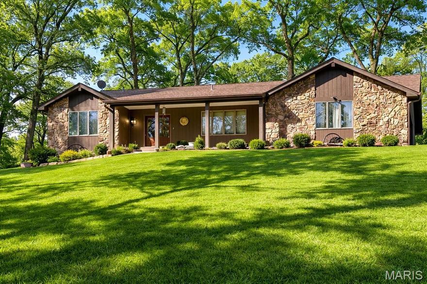 GORGEOUS SECLUDED PROPERTY ON 4.5 ACRES IN HAZELWOOD. Private Road leads up to your new home. One owner since 1983! This home has been EXTREMELY well maintained and has so much love and pride! The only thing this home need is YOUR vision. 4 bedrooms and 2 full baths on main level. HUGE family room that is warmed by the woodburning fireplace. A dining area separates the family room from the kitchen. CLEAN AND DRY basement has SO much potential for another bathroom (has a rough-in) and you can almost double your living space when finished. There is a separate, walk-up exit into the garage from the basement (walk up). Roof replaced in 2024. The main garage is an extremely oversized 2 car garage AND there is a detached 2 car garage/outbuilding, too! You can sit on your front porch or your back patio and admire the wooded scenery. Once Spring hits and the trees fill in........................WOW! 1/2 mile from WHITE BIRCH PARK! Make your appt today!