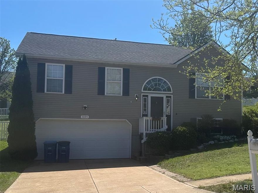 Great location in Seckman Schools.  This home features an open floor plan with vaulted ceiling.  The kitchen boats a large island for entertaining and extra storage.  Stainless appliances to stay.  Bamboo wood floors on main level, ceiling fans much more.  The lower level is finished with a half bath, wet bar and family room area.  The exterior offers an updated deck, vinyl fencing, newer roof, enclosed soffits and new gutters.