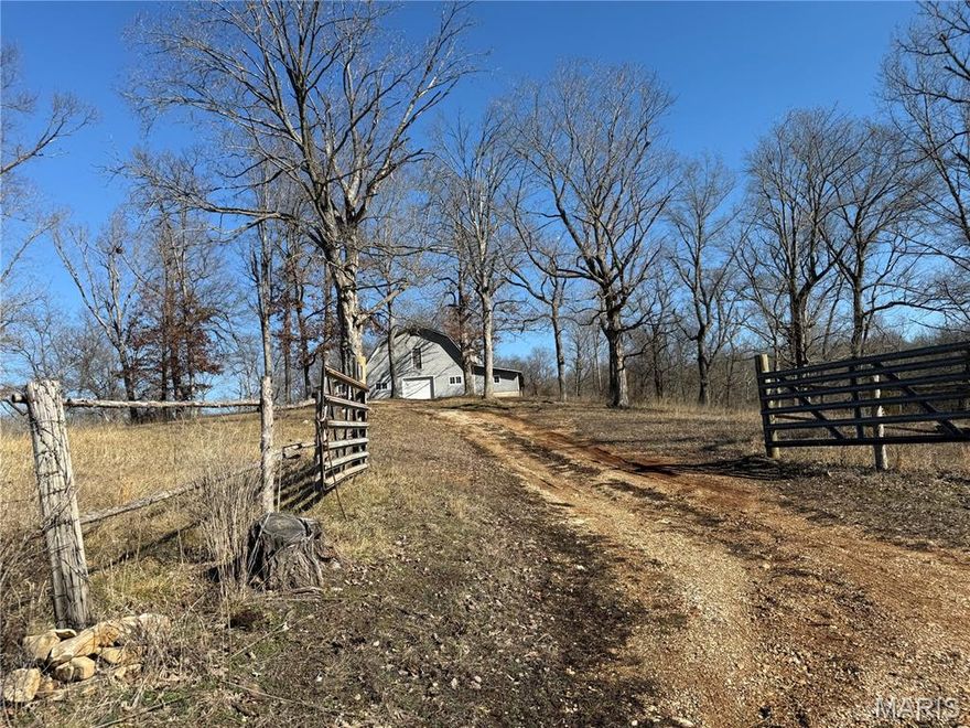 Discover the rare opportunity to own 122 +/- acres of beautiful countryside spanning Franklin and Washington County — a versatile property offering space, privacy, and endless potential. Whether you’re searching for a working farm, recreational retreat, or multi-generational homestead, this one-of-a-kind acreage delivers the perfect blend of rural charm and opportunity. The property features two separate homes, offering exceptional flexibility for multi-generational living, guest accommodations, or private income opportunities. Each residence enjoys the tranquility and scenic views that only large acreage can provide. A serene pond between each home adds both visual charm and recreational enjoyment — perfect for quiet mornings, fishing, or simply taking in the peaceful surroundings. A substantial barn stands as a centerpiece of the property, rich with character and ready to be restored or reimagined. With vision, it could become an impressive agricultural facility, workshop, or statement structure complementing the estate. Both homes are a 2 bedroom 2 bath. Both homes and the barn could use TLC. Sellers are selling as-is.