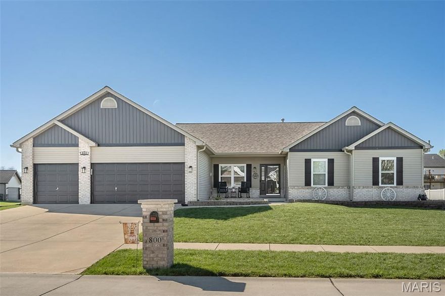 Expansive ranch with a pool! 800 Mule Creek has everything you want in your forever home! This well-maintained home features brand new luxury flooring, vaulted ceilings, a formal dining room, and a gas fireplace. Spacious layout includes a master suite with dual vanities, main floor laundry, and a 3-car garage. Enjoy summer with your own pool and large patio—perfect for entertaining or just lounging around! Roof and siding only a few years old. Move-in ready and close to shopping, schools, and highways!