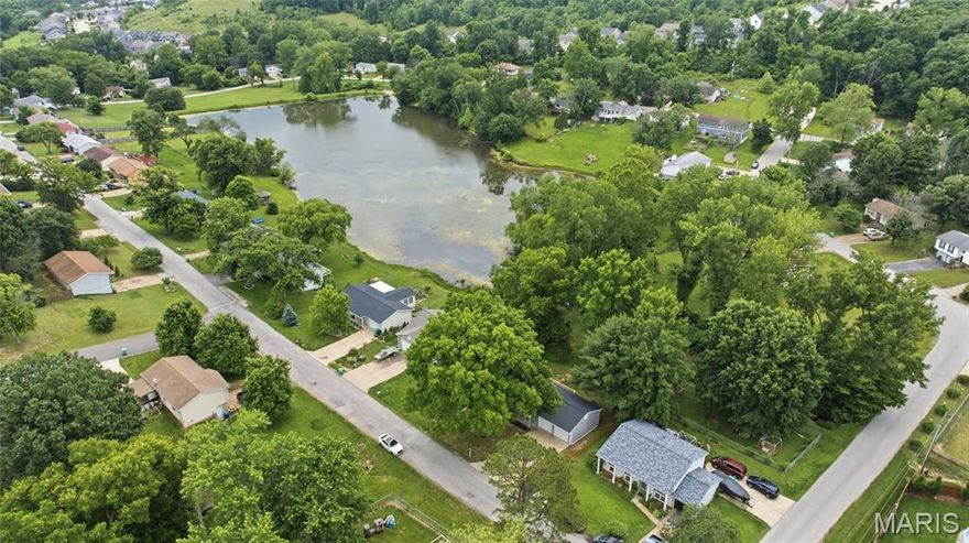 So you want lake living, but it’s always been too far from work or too expensive? Not anymore!

Welcome to this move-in ready 3-bedroom, 2-bath ranch in Fenton offering beautiful lake views and fishing access. Nestled on a spacious, private lot adjacent to the subdivision lake, this rare find combines peaceful lakeside living with everyday convenience near Gravois Bluffs shopping, dining, and entertainment.

Inside, you’ll love the refreshed interior featuring fresh paint, newly installed flooring, updated kitchen and bathrooms, and a finished walk-out lower level. New roof in 2025! The spacious heated 2-car garage adds extra comfort and functionality. 

Step through the kitchen sliding glass doors onto the massive solid deck and take in the serene lake views, or relax and entertain on the beautiful lower patio. With its level lot, gorgeous setting, and unbeatable location, this Fenton lakeview home is one you won’t want to miss.