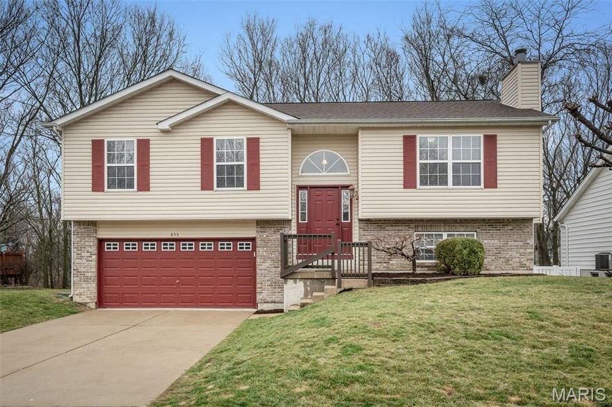 ***OPEN HOUSE CANCELED FOR 3/7 -- PROPERTY IS PENDING***  Welcome home to this charming updated 3 bed/2.5 bath split level nestled on a quiet cul-de-sac, in a highly desirable, family-friendly neighborhood. As you step inside, you’ll be greeted with vaulted ceilings, natural lighting, beautiful brand new LVP throughout the main level, brand new plush carpet in lower level, fresh interior paint throughout & a brand new roof (2025) just to name a few key updates. The functional open floor plan offers comfortable living spaces ideal for entertaining or a just a cozy night in. The spacious walk-out lower level offers endless possibilities, from creating the perfect game room, an additional living area, home theater or whatever suits your lifestyle. Enjoy your morning coffee on the freshly stained deck while soaking in the tranquility of the peaceful wooded treeline for added privacy and a serene setting. Conveniently located near parks, shopping, restaurants & quick Hwy access. Schedule your showing today!