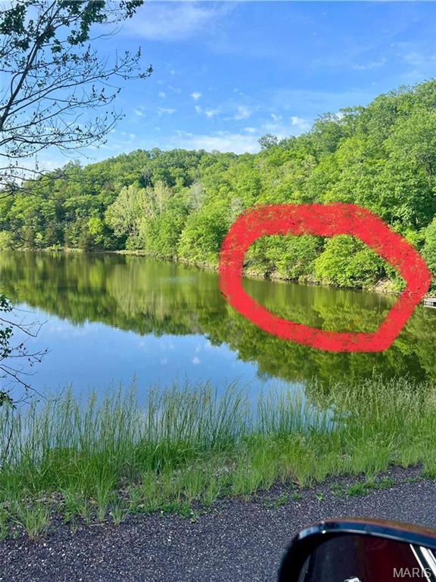 MOTIVATED SELLER!!!  Lake lot on Lake Robinhood in Lake Sherwood MO is now available. Great value! Lot is surveyed and has been partially cleared. Beautiful west exposure providing magnificent sunsets. Build your dream home on this lot, perfect for a walkout basement! You are not required to build. Camping is allowed at the Campgrounds only - you cannot park a camper on this property. Lake Sherwood is a gated lake community located in Warren County MO. Enjoy use of all the amenities, including Six Lakes, Clubhouse & Lakeside Grill, New Community Pool, Sandy Beach to swim & play, 24 hour gated/staffed security, Marina, Fishing Docks, Campground and fun community activities throughout the year! Lake Sherwood is located in Marthasville, close to Augusta, Foristell & New Melle (in the middle of Wine Country) ~ Only 15 mins to Washington & Wentzville! Keep in mind this is a gated community and you must have a Realtor with you to view this property. We invite you to come live the lake life at Lake Sherwood MO!
