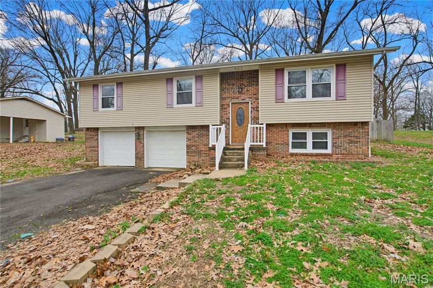 Welcome to this charming 4-bedroom, 2-bath split-level home offering comfort, space, and functionality for everyday living. The open kitchen provides plenty of room for cooking and gathering, seamlessly connecting to the main living areas. Downstairs, you'll find a cozy living room featuring a beautiful fireplace—perfect for relaxing evenings or entertaining guests. The home sits on a nicely sized lot with a fully fenced backyard, providing privacy and plenty of space for outdoor activities, pets, or gardening. With multiple levels of living space and a layout designed for both comfort and convenience, this home is ideal for families or anyone looking for room to spread out. Don't miss the opportunity to make this inviting property your next home!