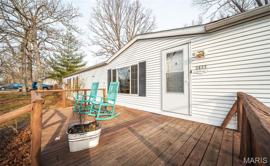 Experience peaceful country living in this 3-bedroom, 2-bathroom manufactured home situated on 0.72 acres m/l just outside Salem, Missouri. Conveniently located only minutes from state parks, the Current River, and Mark Twain National Forest, this property offers easy access to some of the area’s best outdoor recreation. A large front deck welcomes you inside to a comfortable living room that opens to the eat-in kitchen, complete with a breakfast bar and plenty of cabinet space. Just off the kitchen is the laundry area, conveniently positioned near the primary bedroom suite. The suite features a private bathroom with a double vanity, garden tub, and separate shower. Two additional bedrooms and a full guest bathroom are located down the hallway from the living room, offering space for family, guests, or a home office. Step outside to the covered back deck, perfect for relaxing or entertaining while enjoying the peaceful surroundings. The fenced backyard adds extra privacy and functionality. A new septic system has recently been installed, providing added value and peace of mind. If you’re looking for a comfortable home with space to enjoy the outdoors, this property is ready to welcome you.