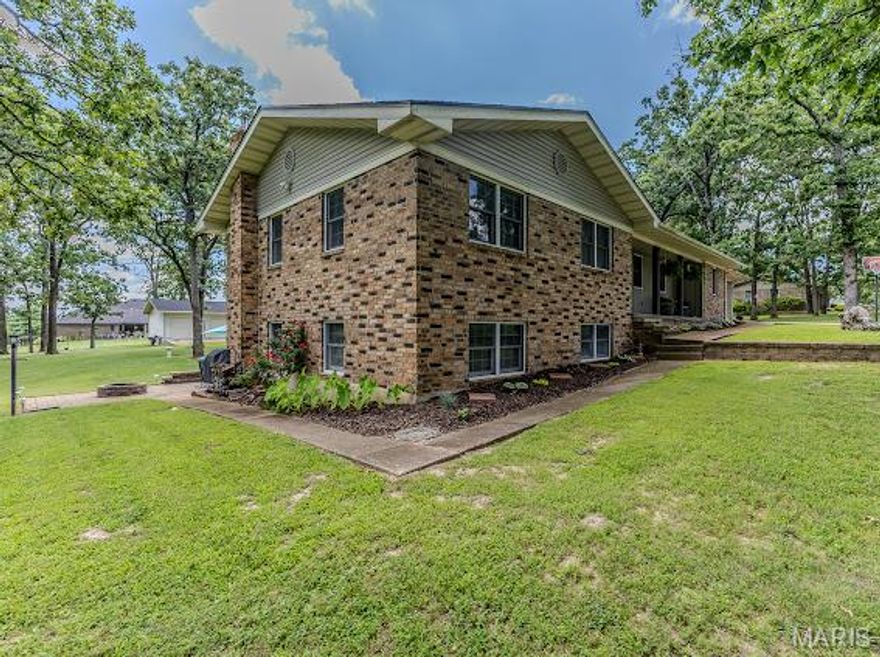 20150 SW OAKWOOD DR. in Lebanon !! THIS 2762 SQ FT ML HOME OFFERS 3,4, or-5 BEDROOMS, 2,5 BATHS in the home, 2 CAR ATTACHED GARAGE with AN ADDITIONAL 4 CAR DETACHED GARAGE OFFERING LIVING QUARTERS w/ bedroom & bath, and its JUST OUTSIDE THE CITY !! A VERY DESIRABLE LOCATION, NEWER ROOF & SIDING, NEWER INTERIOR PAINT, NEW FLOORING, A BEAUTIFULLY UPDATED KITCHEN with GRANITE COUNTERTOPS, A LOT OF STORAGE & CABINETS, BUILT IN DESK, STAINLESS APPLIANCES, LIVING ROOM, FAMILY ROOM, on the main levelEACH with FIREPLACE. THE 4 SEASONS SUNROOM IS THE BEST !! LARGE LAUNDRY- MUD ROOM with a lot of cabinetry and its just off the garage. THE LOWER LEVEL WALK OUT BASEMENT AREA WOULD BE A GREAT RECREATION GAME- ROOM, with a WET BAR, 1/2 bath, and fireplace #3 or CAN BE SEPARATE LIVING QUARTERS. THIS HOME IS ON 1.38 ACRES with LARGE MATURE TREES BLACK TOP ROAD. ! BUILT IN DESK, STAINLESS APPLIANCES, LIVING ROOM, FAMILY ROOM, on the main levelEACH with FIREPLACE. THE 4 SEASONS SUNROOM IS THE BEST !! LARGE LAUNDRY- MUD ROOM with a lot of cabinetry and its just off the garage. THE LOWER LEVEL WALK OUT BASEMENT AREA WOULD BE A GREAT RECREATION GAME- ROOM, with a WET BAR, 1/2 bath, and fireplace #3 or CAN BE SEPARATE LIVING QUARTERS. THIS HOME IS ON 1.38 ACRES with LARGE MATURE TREES BLACK TOP ROAD. PLENTY OF PARKING AREA FOR YOUR GUESTS and FAMILY MAKE YOUR APPOINTMENT TODAY !!