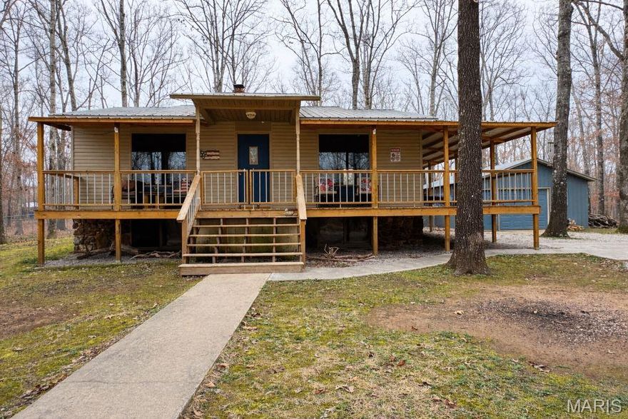 Looking for privacy, seclusion, and great hunting ground? This 3 bedroom, 2 bath home with just under 2500 finished sq ft sits on 5.45 wooded acres at the end of a private, dead-end road.

Completely renovated within the last 3 years with a wraparound porch, appliances, luxury vinyl plank flooring, a cozy pellet stove, new central electric heat and air, plus a new propane wall furnace for backup heat and additional baseboard heat in the finished basement—providing comfort year-round. The wraparound porch is perfect for outdoor living, morning coffee, and evening meals!

The property is extremely pet-friendly, featuring a fenced backyard and including a gazebo, woodshed, and chicken coop/goat pen—ideal for a small homestead. 

A 20x28 detached shop with concrete floors and electric provides plenty of space for storage, projects, or your boat.

Enjoy the best of country living in a prime location between Lake Wappapello and Poplar Bluff!
