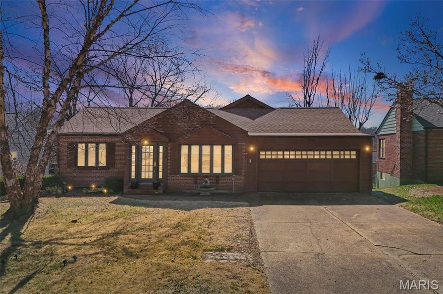 Step inside 9456 Arban Drive in Crestwood, where space, thoughtful design, and unforgettable character create a home that's truly one-of-a-kind. This 4-bedroom, 3 full bath ranch, delivers the square footage, flexibility, and functionality today’s lifestyle warrants. Add intricate design and personality, that you simply cannot replicate and it's a must see. Gleaming hardwood floors throughout the main level, sea-foam green ceramic tile accents add charm and continuity in the kitchen, breakfast room, and hall bath. The completely custom kitchen is a showstopper, designed for both beauty and performance. Beveled-edge granite countertops, beige maple cabinetry, and carved wood posts frame the oven. The cooktop with a telescopic downdraft system, creates a space that feels curated and intentional. Storage, prep space, and layout have been carefully considered, making everyday living and entertaining effortless. Natural light pours into the breakfast room, where a tray ceiling, and a wall of lever-style, Pella windows with built-in blinds create the perfect place for morning coffee. A reading nook/larger landing, connects the breakfast room to the convenient main floor laundry. Sizable laundry room with two, glass-paned french doors, and ceramic tile countertop for folding. Original kitchen cabinetry repurposed for added storage complete this room. Divided bedroom floor plan offers a degree of privacy. Etched glass doors to the generously-sized primary suite, a spacious walk-in closet, and an ensuite bathroom. A charming bay window seat make for the perfect retreat after a long day. But, the primary bathroom is both bold and memorable, showcasing floor to ceiling hunter green ceramic tile. it boasts an oversized soaking tub, glass-framed shower, all the brass finishes, a hexagonal sink, and playful palm tree painted accents. Hallway bath boasts a cohesive, yet nostalgic charm with bubblegum pink tile, striped wallpaper, and the coordinating sea-foam green flooring. Two additional bedrooms offer generous closet space and abundant natural light finishing out this main floor. Downstairs, the fully finished lower level dramatically expands the living space even more and adds endless possibilities. Recessed lighting brightens the larger main living area. A true fourth bedroom with double egress windows and a sizable walk-in closet, is perfect for guests or family. Newer LL bathroom features a corian shower base and inset black and beige tile work with access from both the hallway and main bonus room. As if that's not enough, an in-law suite, complete with a full kitchen showcasing granite countertops, a large 4 X 5 ft picture window, and separate exterior access provides exceptional versatility for multi-generational living. Formerly owned by an interior designer, each detail and thoughtful and intentional use of space, make every inch of this home carefully curated. The repurposed, original kitchen cabinetry used in both the in-law suite and main floor laundry adds a special touch. Outside, a backyard oasis designed for gathering serves up a concrete, in-ground pool, covered patio with recessed lighting and a ceiling fan for warmer summer days. Expansive decking with a gazebo create a perfect place for some early evening shade. Additional highlights include: main floor and lower level laundry hookups, cedar siding, an expansive living room, newer furnace, hot water heater, and roof. A heated, two-car garage. Home is situated in the prestigious Lindbergh School District and maximizes convenience with easy access to 1-270, 44, and all the modern amenities. Steps from Whitecliff and Crestwood Parks, shops, and restaurants. Whether you love the vintage aesthetic or envision your own modern refresh, the footprint of this home provides ample room to make it your own. The possibilities are endless. Being sold, "as is, where is."