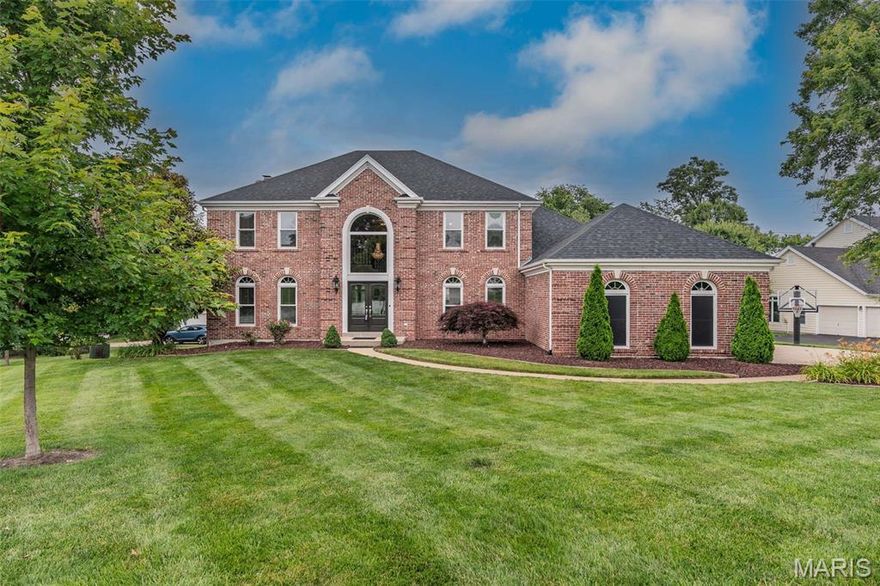 Discover this meticulously maintained 4 bedroom, 4 bath, two story Home in highly desirable Manors of Town and Country Regency Manor. Sitting on a cul-de-sac with more than 3600 sq ft of living space, this Home presents major updates to ease your mind. Foyer with two story updated staircase is flanked by formal Dining Room and Living Room, both offering crown moulding and refinished hardwood floors. Hardwood flows into the Great Room filled with an abundance of natural light, gas fireplace, wet bar and updated Kitchen. Kitchen includes custom cabinets, granite tops, center island and vaulted ceilings adjoined by a Breakfast Room with a built in desk. Main level also includes a Sunroom for entertaining or relaxation, plus a Laundry/mud room leading to the 3 car garage. Second floor has newly installed hardwood floors, 4 Bedrooms including primary suite with coffered ceiling, walk in closet and open bath with custom cabinets and double vanity. Finished Lower Level offers full Kitchen, Family room, sleeping area, bonus room/office and full bath. Popular Parkway School District. Several updates include: fresh colors, roof, gutters, siding, all exterior doors and windows, two HVAC units, water heater, flooring, expanded deck with concrete pad, fixtures and landscaping.