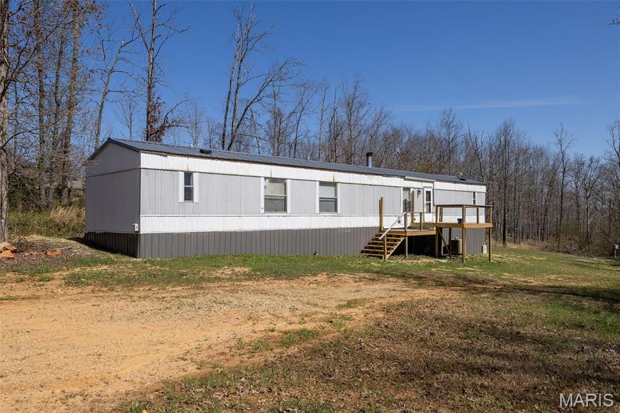 3 Bed, 2 Bath Modular Home on 20 Surveyed Acres with Pond – Prime North Poplar Bluff Location!
Don’t miss this rare opportunity to own 20 beautiful acres in a highly desirable area just north of Poplar Bluff, located outside city limits with no HOA and no restrictions. This 3-bedroom, 2-bath modular home offers comfortable living with a cozy fireplace, public water, and septic already in place.
The property features a scenic pond and plenty of open space, making it ideal for a private homestead, recreational retreat, or future development. The home has been securely set with metal I-beams, and the concrete block foundation has been reinforced by filling with concrete for added stability and peace of mind.
Added value includes two 8x20 shipping containers, perfect for storage or ready to be converted into a future shop building. Electric, water, and sewer are available on the property, providing excellent flexibility for expansion or additional structures.
Access is convenient from County Road 523 (Tower Road), with additional development potential offering access from Alenah Lane—ideal for those considering subdividing or multiple build sites.
Pike Creek Sewer development is underway, with public sewer and water available at the buyer’s expense if desired, though current utilities make it move-in ready today.
Enjoy the perfect blend of country living, functionality, and investment potential—properties like this don’t come along often!