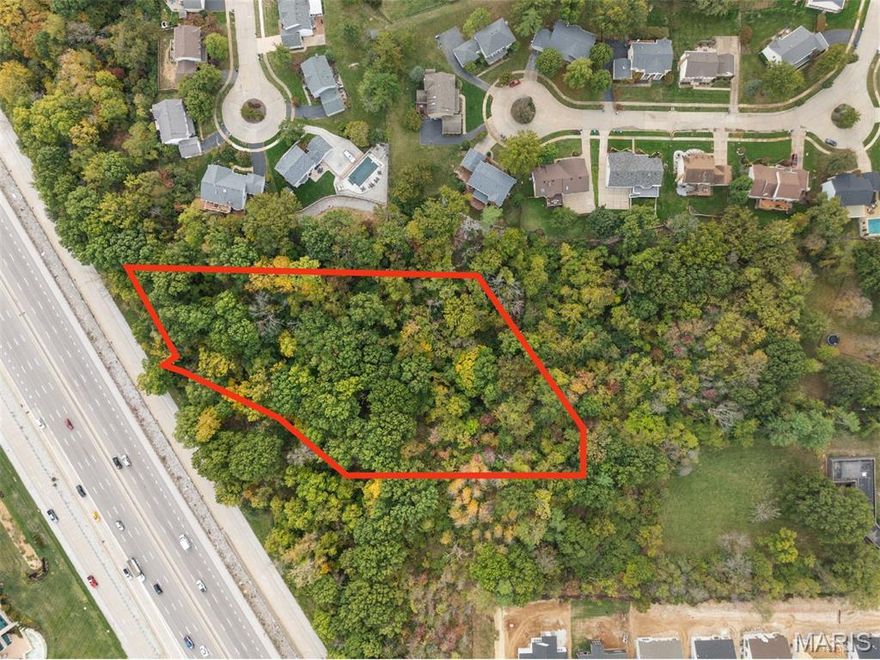 Excellent opportunity to build your dream home on this 3 acre lot within the Parkway Central School District with easy access to Hwy 40/64, shopping, dining, and Chesterfield Valley amenities. Chesterfield letter in supplements indicates this 3 acre lot is zoned for a minimum of 0.5 acre lots (or have the whole 3 acres to yourself for an abundance of privacy)! See the documents in supplements which includes the original 2 lot survey of 6 acres that were being sold together in 2018 (the other 3 acre lot has been sold). The lot boundary lines on drone shots are approximate and should be verified by buyer with their own due diligence and a survey of this 3 acre lot.