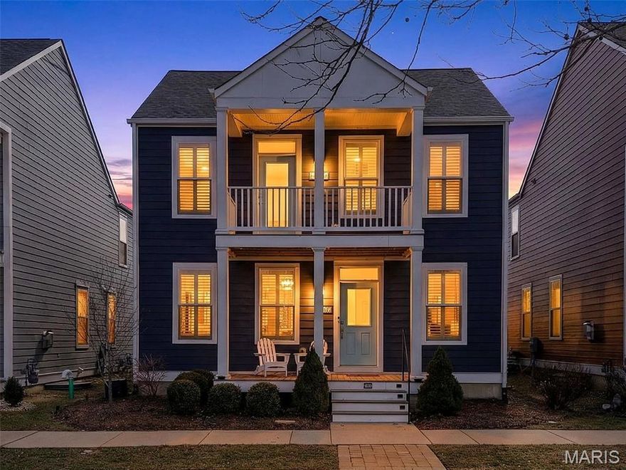 Gorgeous, Upgraded Home w/ Double Balconies and Exceptional Detail Throughout! This beautifully appointed 4-bedroom, 2.5-bath home offering nearly 2,300 sq. ft. From the moment you step inside, you’ll notice the impressive 9’ ceilings on both the main and upper levels, plantation shutters throughout, 3 panel doors &  engineered hardwood flooring across the main floor. The heart of the home is the stunning kitchen, featuring quartz countertops, designer backsplash, 42” custom cabinetry with crown molding and under-cabinet lighting, a spacious island with seating, gas stove, and stainless steel appliances. The living room is anchored by a warm gas fireplace framed with custom built-in bookshelves, while the dining area showcases add'l custom cabinetry. Laundry room (washer and dryer included), custom coat closet, and powder room complete the main level. Upstairs, retreat to the luxurious primary suite, offering dual custom closets with built-in shelving, private access to your own veranda balcony, and bathroom with dual adult-height vanities and a stand-alone shower. Three additional bedrooms—one with a walk-in closet—along with a spacious loft, hall bath, and linen closet. The lower level includes custom shelving for excellent storage and is ready for your unique design should you desire additional finished space. Step outside to a truly gorgeous backyard, professionally landscaped with custom fencing and stamped concrete, creating an ideal setting for relaxing or entertaining. A 2-car attached garage and extended driveway complete this exceptional property.  Nestled in one of the area’s most desirable communities, this vibrant neighborhood called New Town @ St. Charles offers resort-style living at its finest — featuring pools, including an impressive 700-foot lazy river. Enjoy scenic lakes and canals ideal for fishing, swimming, floating, kayaking, and paddleboarding, along with an amphitheater, popular restaurants, volleyball and pickleball leagues, a grocery store, charming shops, and so much more — all designed for an active, connected lifestyle.