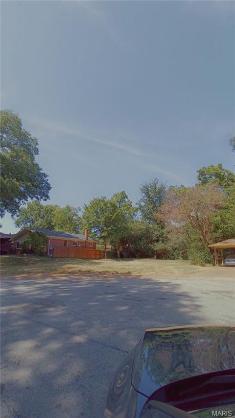 Photo of 8015 Noel Court, University City, MO 63130 (MLS # 26018037)