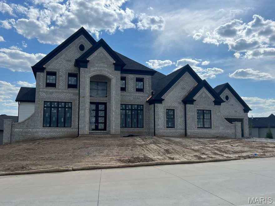New Construction, Chesterfield, Rockwood Schools! MACNIFICENT 1.5 Story home with Finished Lower Level in a FABULOUS LOCATION! Crafted by St. Louis' premier hands-on builder, Claymont Development, LLC - Wesley Byrne. The WINGATE III is a spectacular 5BR, 4.5 bath with 5400 sqft of exquisitely finished Living space. Exterior features a warm blend of brick & stone; extensive millwork; the two-story entry foyer makes a striking first impression! Formal dining room with wainscoting and den/office on either side of the Foyer; two-owner's suite with dual closets. Three bedrooms, 2 baths, and bonus room complete the upper level. 10' main floor ceiling, 8' doors, 4-car garage; screened-in porch and deck overlooks common ground! Sensational LL includes brick/stone wet bar, huge rec-room, 5th bed & full bath.  Amenities include: onsite pickle-ball court, walking trail, common ground, & gazebo. Pictures of a previously built home. Tour is of the Display Home.