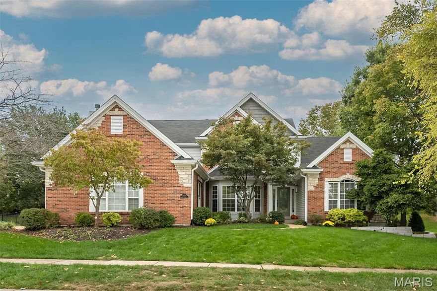 Exceptional brick & stone 1.5 Sty in desirable Estates at Baxter Pointe features distinctive design elements & updates throughout including an open floor plan, soaring ceilings, oak hardwoods & detailed trim work.  Impressive covered porch entrance leads to 2-sty foyer, private office w/ built-in work center, formal DR framed by arched entryways w/ architectural columns & stunning GR room w/ direct vent fireplace & dramatic wall of windows. Designer kitchen w/ granite countertops, staggered cabinetry, stainless steel appliances, butterfly center island & convenient planning center adjoins hearth room highlighted by floor-to-ceiling stone fireplace & light-filled breakfast room w/ sliding glass door that opens to screened porch. Stylish powder room w/ stacked stone accent wall. Coffered primary bedroom suite w/ luxury bath & 2 walk-in closets offers an appealing retreat. The 2nd floor extends the living quarters w/ 4 additional bedrooms, 1 w/ ensuite bath & 2 w/ Jack n’ Jill bath. Lower level entertainment space includes spacious recreation room w/ wet bar, media room & half bath. Outdoor living spaces galore; ideal for relaxing or entertaining; screened in porch, deck, stamped concrete patio w/ firepit & paver patio; overlooking the fenced, tree-lined yard. 3-car side entry garage. Conveniently located just minutes from Chesterfield Amphitheater, Aquatic Center, restaurants, shopping & HWY 40/64. Wild Horse Elementary is a short walk away.