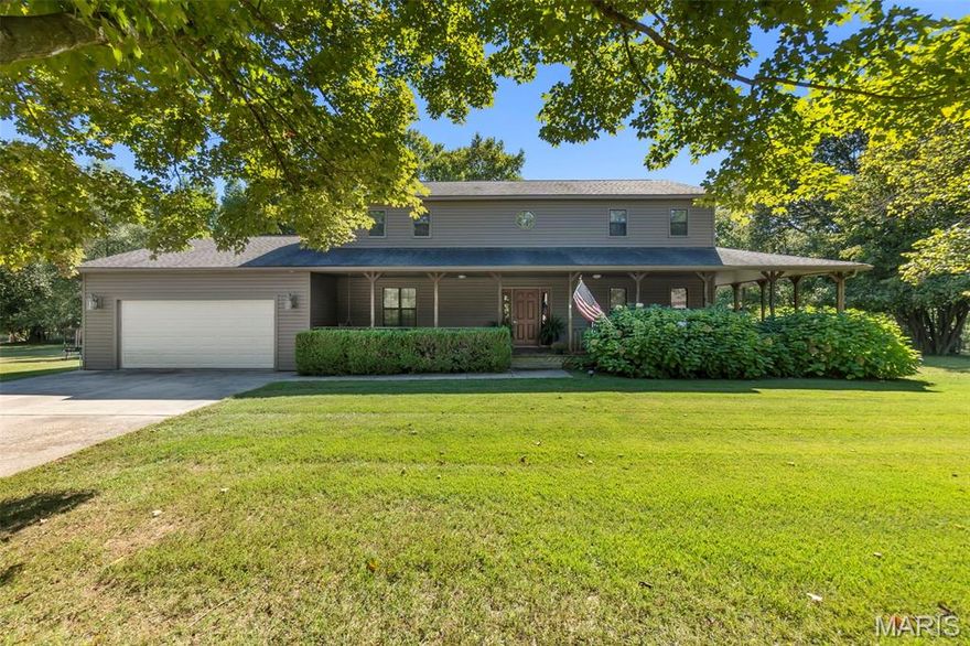 Welcome home to this charming two-level property on a spacious 1.8-acre corner lot. Featuring a welcoming front foyer and a bright kitchen with like-new appliances, this home offers comfort and functionality throughout. The main floor includes a convenient laundry area, and the two-car garage comes with a dedicated workshop space for projects or extra storage. Enjoy peaceful evenings on the spacious porch that extends across the front and side of the home. With an HVAC system only three years old, this property blends country charm, modern convenience, and plenty of space—ready for its next owner to enjoy.