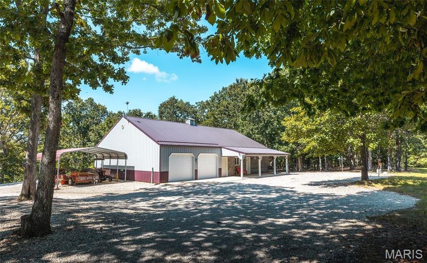 This highly productive hunting property is a turnkey, ready-to-enjoy outdoor retreat. Spanning 105.8 surveyed acres of scenic Ozark terrain, it sits perfectly between the Coffee Creek and Indian Creek arms of the Lake of the Ozarks. With over 2 acres of established food plots and one pond, the land is rich in wildlife and features mature, marketable timber. The area supports a strong population of mature deer, proven by years of successful hunts by the current owners.
Access is convenient via blacktop road, and the property includes a beautiful, low-maintenance 40x60 building. Inside, you’ll find 1,350 sq ft of comfortable living space and a 1,200 sq ft workshop. The 4-bedroom, 3-bath lodge is outfitted with attractive hickory cabinets and plenty of storage. Outside, enjoy the custom fire pit or relax on the peaceful, covered front porch.
The property comes well-equipped with appliances and multiple deer stands already in place. Whether you're looking for a serious hunting spot or a quiet getaway, this place has something for everyone.