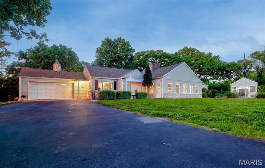 Situated on 12.56 acres of beautiful land right on the western edge of Rolla, this property has prime commercial potential! Located between Martin Spring Dr. and the Rolla City Airport, there is easy access and visibility to the interstate making this just right for a business with a residence included. The home is a classic rambling ranch with custom woodwork, three fireplaces, large bedrooms, an awesome bar/rec room, 3 fireplaces and a formal dining room along with an eat-in kitchen. The full basement is partially finished with a family room with fireplace and plumbing in place for a full bath along with laundry and work room space. The home has a newer roof (2017), an all new HVAC with a heat pump (November 2019) and all new electric service along with other updates. The property also has a large wooden barn with a concrete floor (the barn roof has failed), and detached work shop. A garden area with large concrete patio is located just off of the rec room. Come see this unique property and see what could be yours!