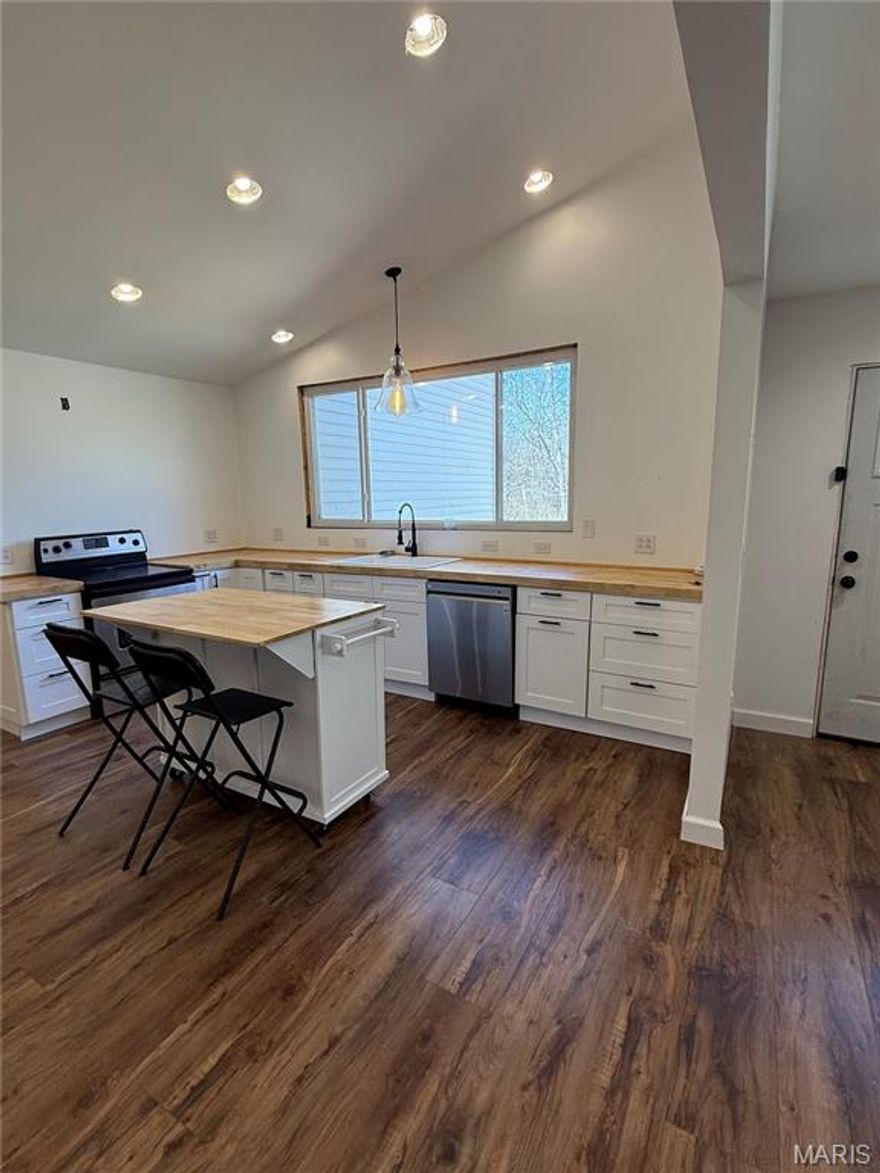 Nestled on 4.7 private acres, this partially remodeled home offers incredible potential and room to grow. The front half is move-in ready, featuring an updated kitchen, two remodeled baths, and a spacious primary bedroom. The back half includes three additional bedrooms and one bath—ready for your finishing touches. Major updates completed for peace of mind: septic pumped with riser added (2023), well pump (2024) with filtration system, roof (2020), HVAC (2023).

Enjoy the serenity of country living with modern essentials already in place—just bring your vision to complete this opportunity!