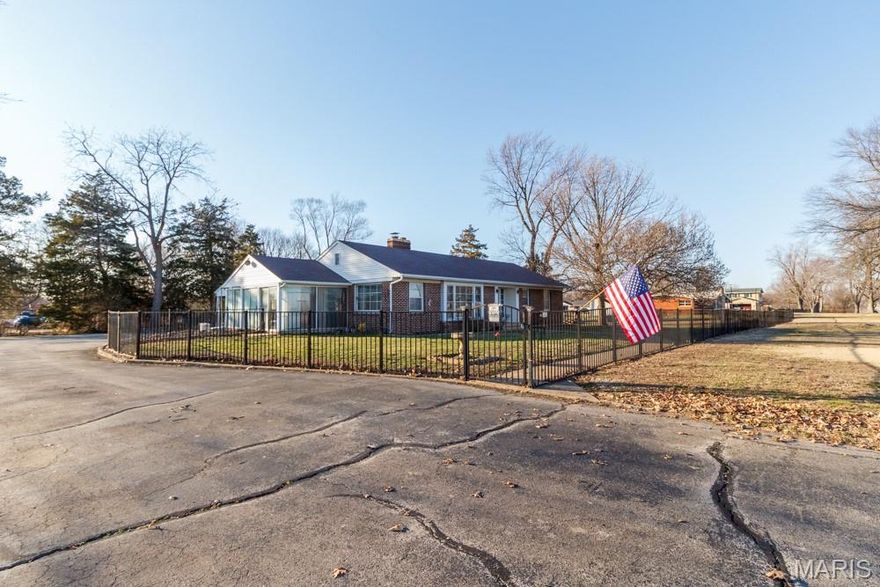 RARE OPPORTUNITY TO OWN A PROPERTY THAT WOULD MAKE A GREAT COMMERCIAL SPOT OR EVEN THAT PERSON THAT DESIRES CONVENIENCE! Located on approximately 1.5 acres with great highway visibility, this beautifully maintained 3-bedroom, 2-bath brick home that perfectly blends comfort, space, and charm. From the moment you arrive, the classic brick exterior and inviting front entrance set the tone for what awaits inside. Step in to discover multiple spacious living areas designed for both everyday living and entertaining, including a cozy living room featuring warm flooring, a stunning fireplace, and built-in shelving that adds both character and functionality. Large windows throughout the home allow for an abundance of natural light, creating a bright and welcoming atmosphere in every room. The kitchen offers generous cabinetry, ample counter space, and stainless steel appliances, making meal prep and gatherings both easy and enjoyable, while the adjoining dining area provides a warm and inviting space for family dinners or hosting friends. One of the standout features of the home is the incredible sunroom surrounded by windows, filling the space with natural light and offering the perfect spot to relax, entertain, or enjoy peaceful views of the yard year-round. Outside, the property continues to impress with a spacious yard and fenced area that provides privacy and plenty of room for pets, gardening, or outdoor gatherings. With its solid construction, functional layout, and inviting character throughout, this home offers the perfect blend of comfort, space, and timeless appeal.